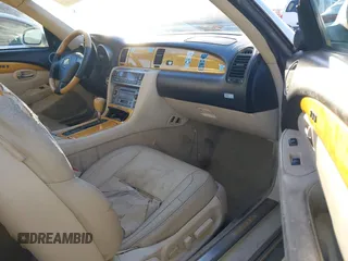 2003 Lexus SC 430 with VIN JTHFN48Y230044310, listed as a IAAI auction lot 41403951 with 130,183 mi miles and . Bid and sale history available at DreamBid. Image 5.