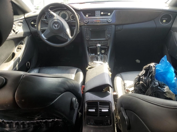 2009 Mercedes-Benz CLS 550 with VIN WDDDJ72X59A151589, listed as a Copart auction lot 55443365 with 184,996 mi miles and Salvage title. Bid and sale history available at DreamBid. Image 8.