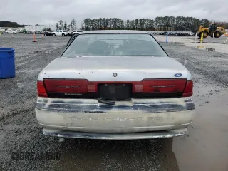 1990 Ford Thunderbird with VIN 1FAPP6046LH182637, listed as a Copart auction lot 82300484 with 149,365 mi miles and Salvage Title. Bid and sale history available at DreamBid. Image 6.