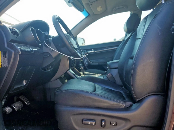2012 Kia Sorento SX with VIN 5XYKW4A28CG234559, listed as a Copart auction lot 58477575 with 129,400 mi miles and Clean title. Bid and sale history available at DreamBid. Image 7.