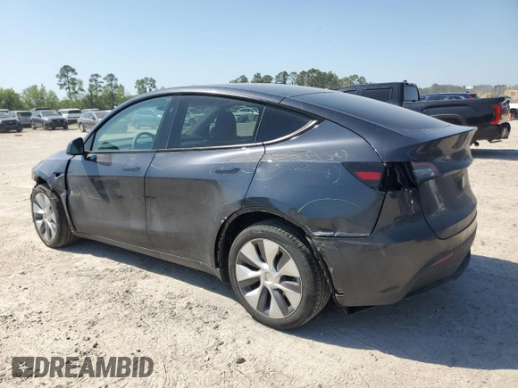 2024 Tesla Model Y Long Range with VIN 7SAYGDEE5RA282984, listed as a Copart auction lot 52388455 with 11,922 mi miles and Salvage Title. Bid and sale history available at DreamBid. Image 2.