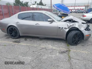 2005 Maserati Quattroporte z VIN ZAMCE39A350020161, wystawiony jako IAAI lot #41891883 z przebiegiem 82 723 mil mil oraz . Historia ofert i sprzedaży dostępna na DreamBid. Obrazek 14.