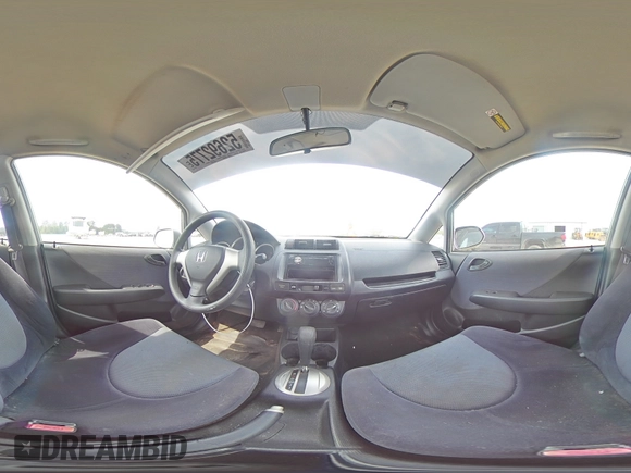 2007 Honda Fit z VIN JHMGD38427S021652, wystawiony jako Copart lot #52692775 z przebiegiem 178 416 mil mil oraz Szkoda całkowita • Salvage title. Historia ofert i sprzedaży dostępna na DreamBid. Obrazek 13.