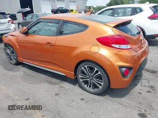 2016 Hyundai Veloster Turbo z VIN KMHTC6AE8GU302247, wystawiony jako IAAI lot #42619624 z przebiegiem 35 112 mil mil oraz . Historia ofert i sprzedaży dostępna na DreamBid. Obrazek 3.