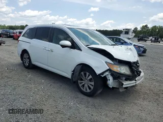 2014 Honda Odyssey EX-L with VIN 5FNRL5H67EB051217, listed as a Copart auction lot 59954225 with 262,816 mi miles and Salvage title. Bid and sale history available at DreamBid. Image 4.