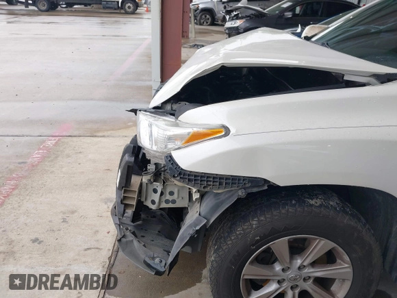 2013 Toyota Highlander with VIN 5TDZA3EH1DS037033, listed as a IAAI auction lot 39453343 with 163,149 mi miles and . Bid and sale history available at DreamBid. Image 13.