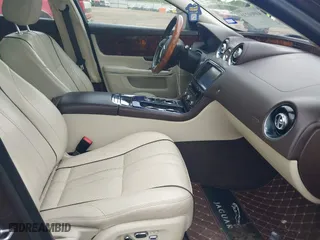 2011 Jaguar XJ with VIN SAJWA2GB9BLV12305, listed as a IAAI auction lot 41960231 with 105,742 mi miles. Bid and sale history available at carsss.com. Image 5.