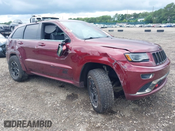 2016 Jeep Grand Cherokee Overland with VIN 1C4RJFCG0GC406160, listed as a IAAI auction lot 42716239 with 95,420 mi miles and . Bid and sale history available at DreamBid. Image 1.