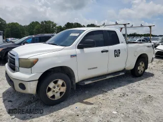 2011 Toyota Tundra with VIN 5TFRY5F16BX104676, listed as a Copart auction lot 60723225 with 394,804 mi miles and Clean title. Bid and sale history available at DreamBid. Image 1.