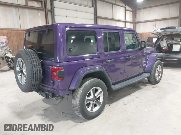 2023 Jeep Wrangler Sahara with VIN 1C4HJXEN9PW560958, listed as a IAAI auction lot 41980179 with 35,975 mi miles and . Bid and sale history available at DreamBid. Image 4.