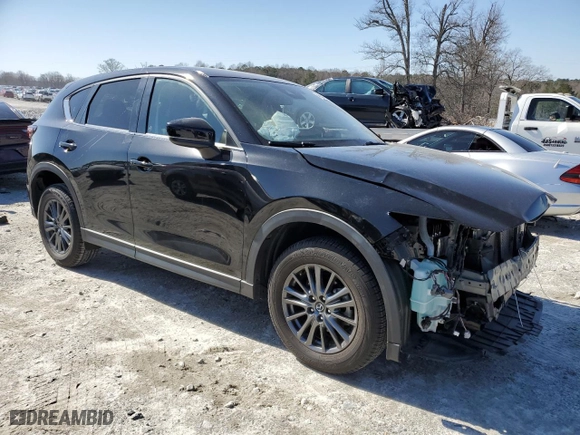 2021 Mazda CX-5 Touring with VIN JM3KFACM2M0443131, listed as a Copart auction lot 48559035 with 31,733 mi miles and Salvage Title. Bid and sale history available at carsss.com. Image 4.