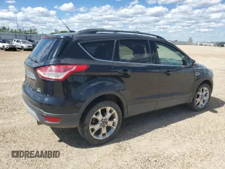 2013 Ford Escape SEL with VIN 1FMCU9H94DUA50063, listed as a Copart auction lot 63008005 with 225,421 mi miles and Salvage title. Bid and sale history available at DreamBid. Image 3.