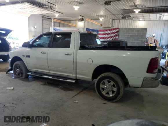 2012 Ram 2500 SLT with VIN 3C6TD5DT5CG112948, listed as a Copart auction lot 68581694 with 207,960 mi miles and Salvage title. Bid and sale history available at DreamBid. Image 2.