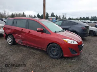 2015 Mazda 5 Touring with VIN JM1CW2CL0F0188959, listed as a IAAI auction lot 41702425 with 104,952 mi miles. Bid and sale history available at carsss.com. Image 1.