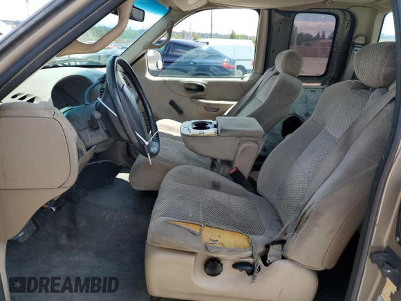 2001 Ford F-150 with VIN 1FTPX17L21NA37619, listed as a Copart auction lot 56922485 with 212,148 mi miles and Salvage title. Bid and sale history available at DreamBid. Image 7.