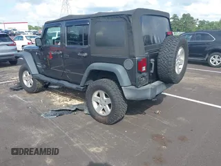 2016 Jeep Wrangler Unlimited Sport with VIN 1C4BJWDG7GL329660, listed as a IAAI auction lot 42482861 with 115,622 mi miles and . Bid and sale history available at DreamBid. Image 3.