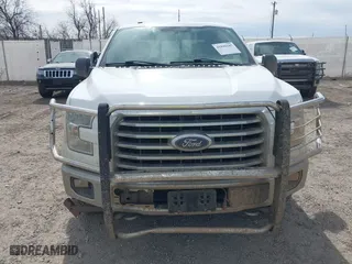 2015 Ford F-150 XLT w/HD Payload Pkg with VIN 1FTFW1EF3FFB70225, listed as a IAAI auction lot 41890185 with 169,564 mi miles. Bid and sale history available at carsss.com. Image 6.