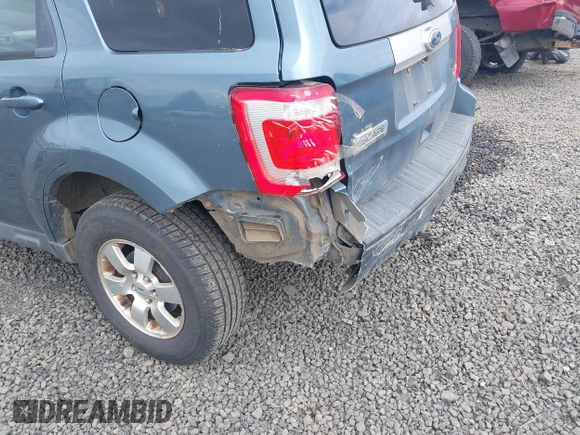 2010 Ford Escape Limited z VIN 1FMCU9EG5AKD30214, wystawiony jako IAAI lot #42014684 z przebiegiem 153 360 mil mil oraz . Historia ofert i sprzedaży dostępna na DreamBid. Obrazek 6.