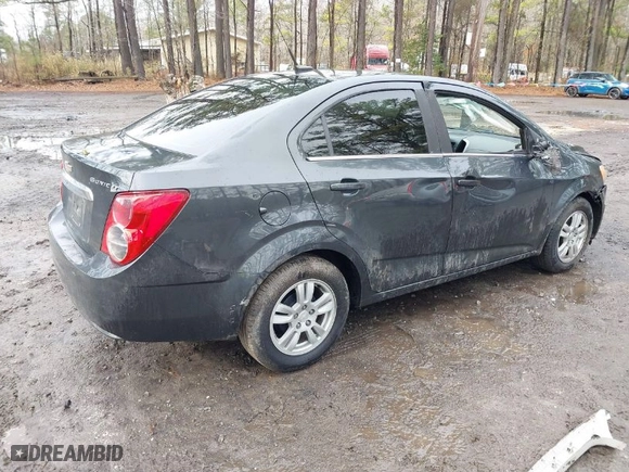 2014 Chevrolet Sonic LT with VIN 1G1JC5SH8E4234634, listed as a IAAI auction lot 41464054 with 117,113 mi miles. Bid and sale history available at carsss.com. Image 4.