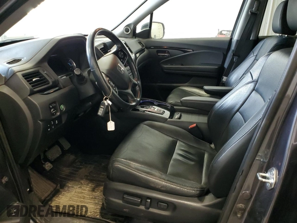 2019 Honda Pilot Touring 8-Passenger z VIN 5FNYF6H93KB502528, wystawiony jako Copart lot #51811045 z przebiegiem 157 204 mil mil oraz Czysty tytuł • Clean title. Historia ofert i sprzedaży dostępna na DreamBid. Obrazek 7.