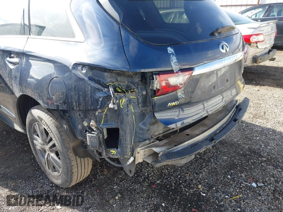 2020 Infiniti QX60 Luxe with VIN 5N1DL0MM0LC530960, listed as a IAAI auction lot 41718329 with 89,446 mi miles and . Bid and sale history available at DreamBid. Image 6.