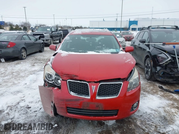 2009 Pontiac Vibe with VIN 5Y2SM67059Z411893, listed as a IAAI auction lot 41446097 with 94,159 mi miles. Bid and sale history available at carsss.com. Image 12.