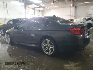2013 BMW 5 Series 550i xDrive with VIN WBAFU9C59DDY70691, listed as a Copart auction lot 87702305 with 225,677 mi miles and Salvage Title. Bid and sale history available at carsss.com. Image 2.