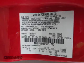 2008 Ford Focus S with VIN 1FAHP34N88W131777, listed as a IAAI auction lot 41942126 with 145,708 mi miles. Bid and sale history available at carsss.com. Image 9.