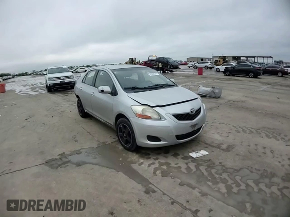 2010 Toyota Yaris with VIN JTDBT4K39A1380336, listed as a Copart auction lot 51855835 with 141,745 mi miles and Salvage Title. Bid and sale history available at DreamBid. Image 11.