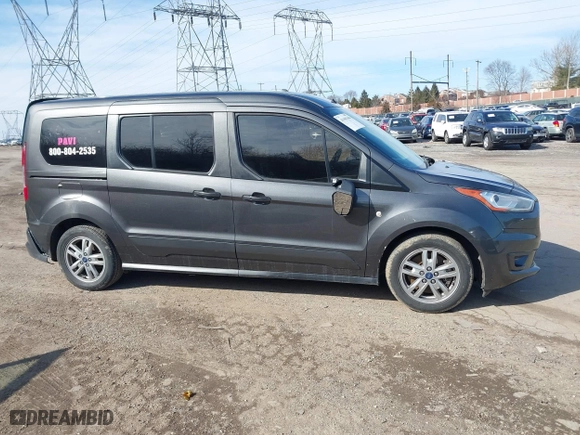 2019 Ford Transit Connect Wagon XLT with VIN NM0GE9F22K1391241, listed as a IAAI auction lot 41601446 with 127,161 mi miles. Bid and sale history available at carsss.com. Image 14.