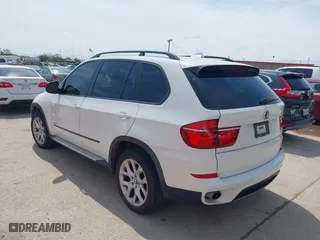 2011 BMW X5 35i with VIN 5UXZV4C57BL401794, listed as a IAAI auction lot 41897040 with 1 mi miles. Bid and sale history available at carsss.com. Image 3.