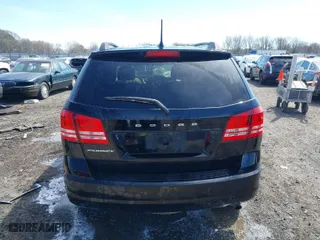 2017 Dodge Journey SE with VIN 3C4PDCAB2HT698940, listed as a IAAI auction lot 41843176 with 141,499 mi miles. Bid and sale history available at carsss.com. Image 16.