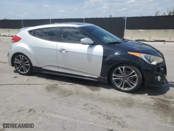 2014 Hyundai Veloster Turbo with VIN KMHTC6AE0EU192680, listed as a Copart auction lot 54486575 with 129,949 mi miles and Clean Title. Bid and sale history available at carsss.com. Image 4.
