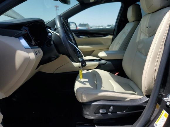 2018 Cadillac XT5 FWD with VIN 1GYKNARS5JZ155879, listed as a Copart auction lot 59568525 with 88,376 mi miles and Salvage title. Bid and sale history available at DreamBid. Image 7.