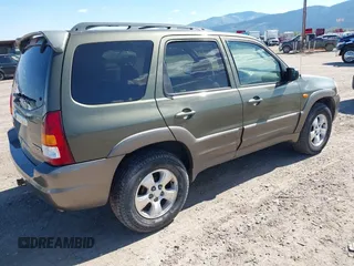 2002 Mazda Tribute LX with VIN 4F2CU08152KM02067, listed as a IAAI auction lot 42198970 with 212,613 mi miles and . Bid and sale history available at carsss.com. Image 4.