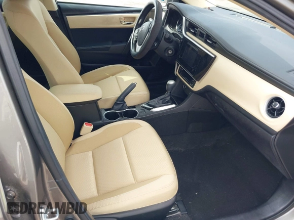 2018 Toyota Corolla L with VIN 5YFBURHE6JP774827, listed as a IAAI auction lot 42598086 with 29,400 mi miles and . Bid and sale history available at DreamBid. Image 5.