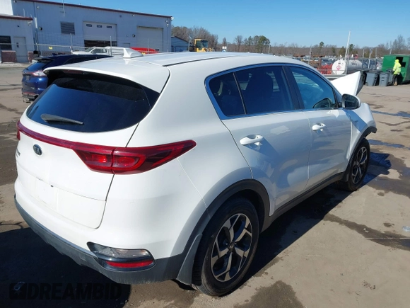 2020 Kia Sportage LX with VIN KNDPMCAC4L7792355, listed as a IAAI auction lot 41433828 with 67,139 mi miles. Bid and sale history available at carsss.com. Image 4.