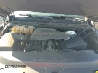 2020 Ram 1500 Big Horn z VIN 1C6SRFFM5LN341324, wystawiony jako Copart lot #67197375 z przebiegiem 61 786 mil mil oraz Nie do naprawy • Non repairable. Historia ofert i sprzedaży dostępna na DreamBid. Obrazek 13.