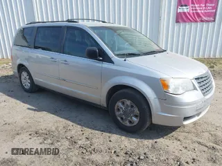 2010 Chrysler Town & Country LX with VIN 2A4RR4DE2AR113041, listed as a IAAI auction lot 41912924 with 200,143 mi miles and . Bid and sale history available at DreamBid. Image 1.