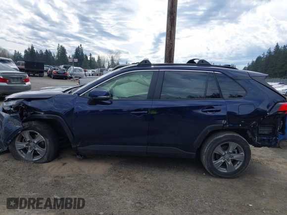 2023 Toyota RAV4 XLE with VIN JTMP1RFV1PD095688, listed as a IAAI auction lot 41874720 with 59,737 mi miles. Bid and sale history available at carsss.com. Image 14.
