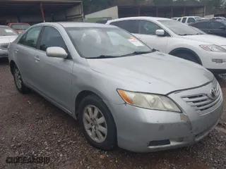 2007 Toyota Camry CE with VIN 4T1BE46K77U513111, listed as a IAAI auction lot 41561545 with 310,776 mi miles. Bid and sale history available at carsss.com. Image 1.