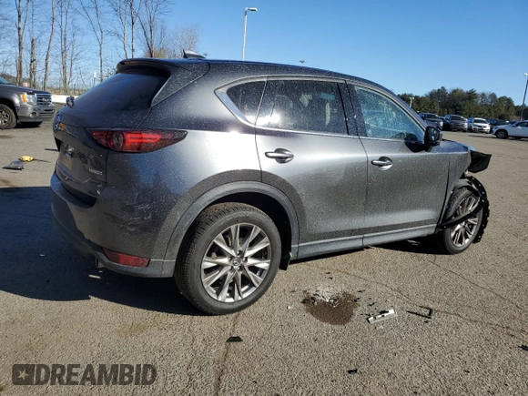 2021 Mazda CX-5 Grand Touring with VIN JM3KFBDM1M0489859, listed as a Copart auction lot 48688905 with 36,882 mi miles and Salvage Title. Bid and sale history available at DreamBid. Image 3.