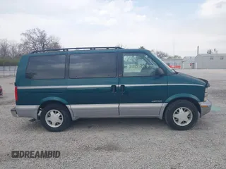 1997 Chevrolet Astro with VIN 1GNDM19W9VB205001, listed as a IAAI auction lot 42002535 with 136,734 mi miles. Bid and sale history available at carsss.com. Image 13.