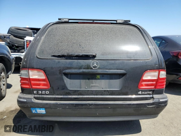 2001 Mercedes-Benz E-Class AWD with VIN WDBJH82J71X051634, listed as a Copart auction lot 51299544 with 286,211 mi miles and Salvage Title. Bid and sale history available at carsss.com. Image 6.