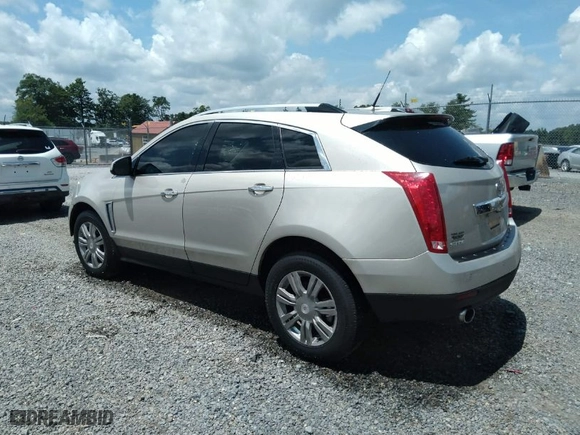 2013 Cadillac SRX Luxury Collection with VIN 3GYFNCE30DS648561, listed as a IAAI auction lot 37139216 with 133,368 mi miles. Bid and sale history available at carsss.com. Image 3.