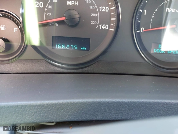 2006 Jeep Grand Cherokee Laredo with VIN 1J8GS48K86C348389, listed as a IAAI auction lot 41187321 with 166,275 mi miles. Bid and sale history available at carsss.com. Image 7.