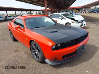 2016 Dodge Challenger R/T Scat Pack z VIN 2C3CDZFJ5GH353463, wystawiony jako IAAI lot #41813082 z przebiegiem 24 033 mil mil oraz . Historia ofert i sprzedaży dostępna na DreamBid. Obrazek 1.