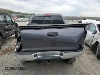 2014 Toyota Tacoma with VIN 3TMLU4EN7EM146056, listed as a Copart auction lot 54554255 with 116,035 mi miles and Salvage Title. Bid and sale history available at DreamBid. Image 6.