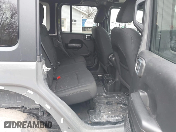 2021 Jeep Wrangler Unlimited Sport Altitude with VIN 1C4HJXDG1MW603784, listed as a IAAI auction lot 41509231 with 102,567 mi miles and . Bid and sale history available at DreamBid. Image 8.