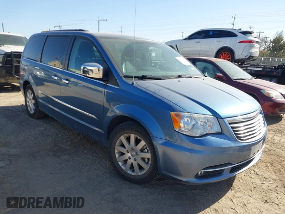 2012 Chrysler Town & Country Touring L with VIN 2C4RC1CG9CR163477, listed as a IAAI auction lot 41214896 with 112,763 mi miles and . Bid and sale history available at DreamBid. Image 1.